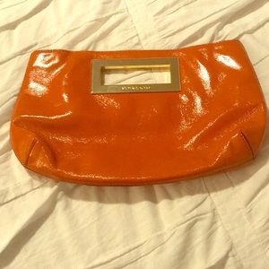 Michael Kors orange clutch